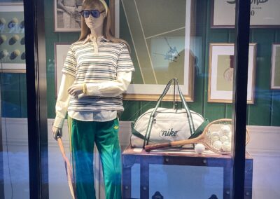tennis vintage window display mannequin with wooden racket Simons